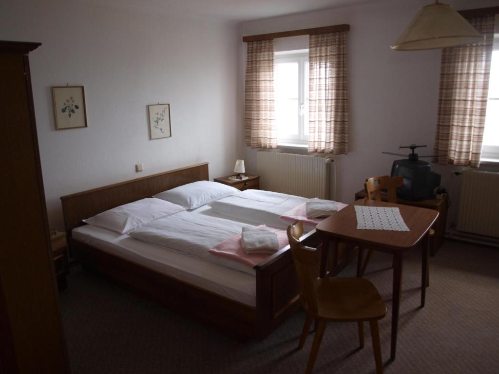 Postel nebo postele na pokoji v ubytování Gaberlhaus
