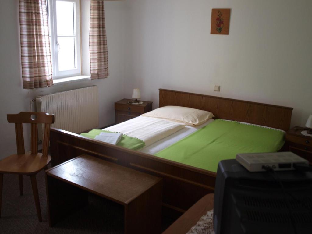 Postel nebo postele na pokoji v ubytování Gaberlhaus