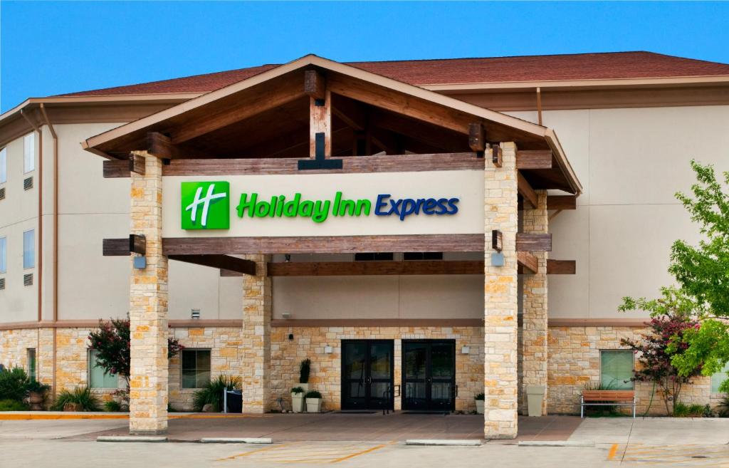 a building with a sign for a holiday inn express at Holiday Inn Express of Salado-Belton by IHG in Salado