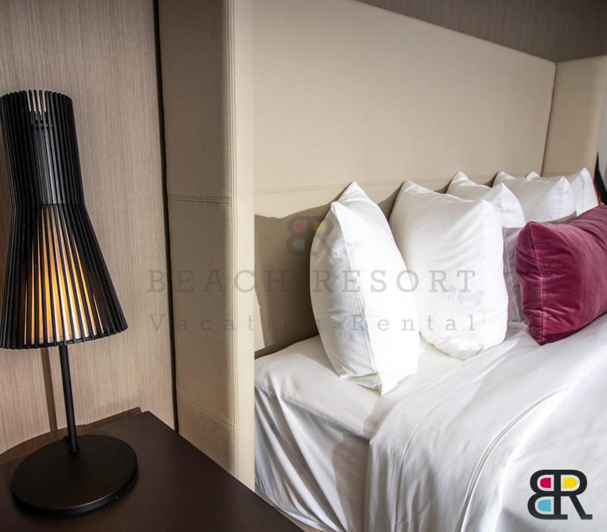 Postel nebo postele na pokoji v ubytování HYDE Beach House Apartments