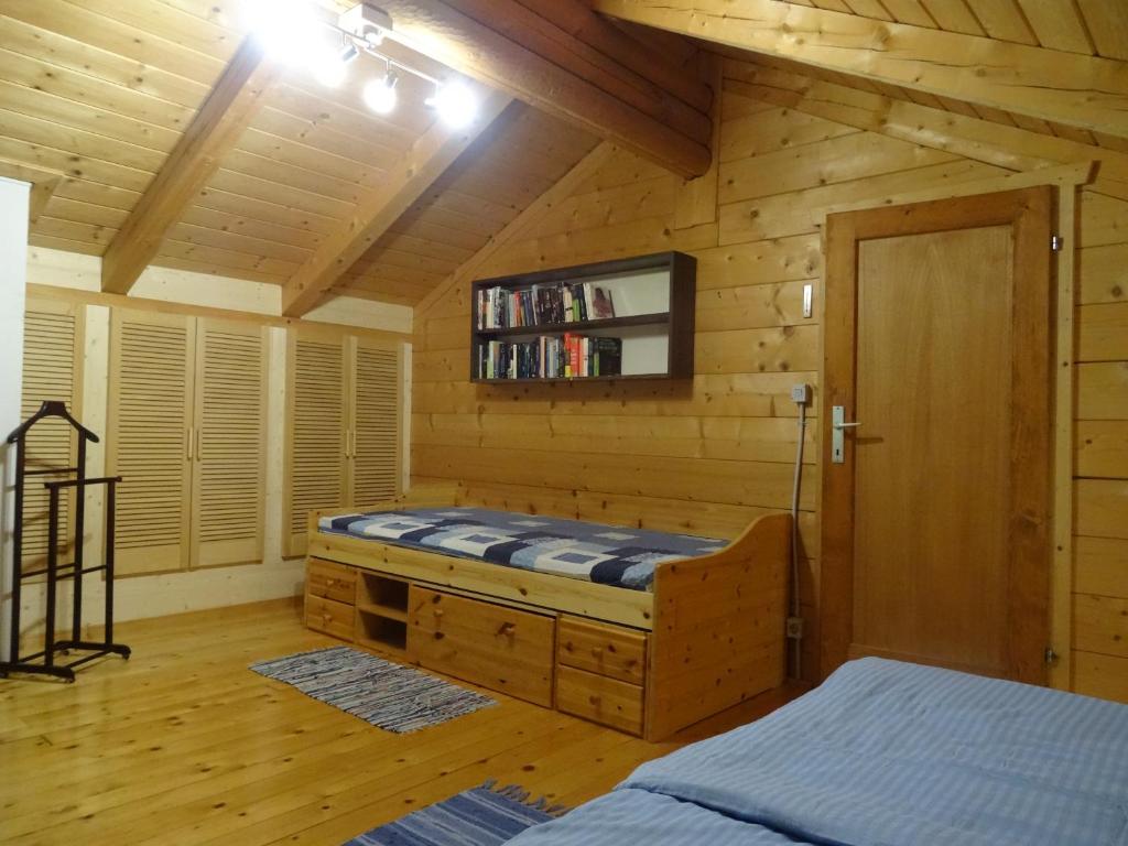 Postel nebo postele na pokoji v ubytování Ferienhütte Hochalm