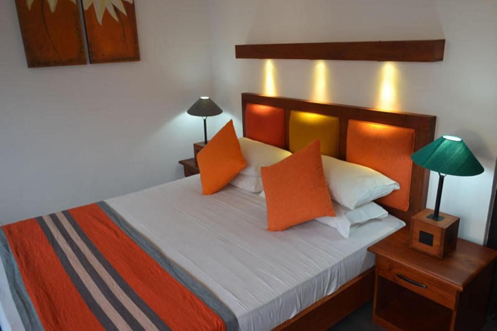 Postel nebo postele na pokoji v ubytování Star Beach Guest House
