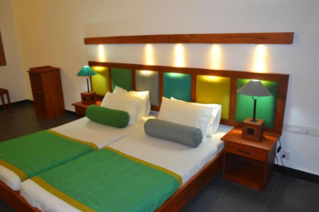 Postel nebo postele na pokoji v ubytování Star Beach Guest House
