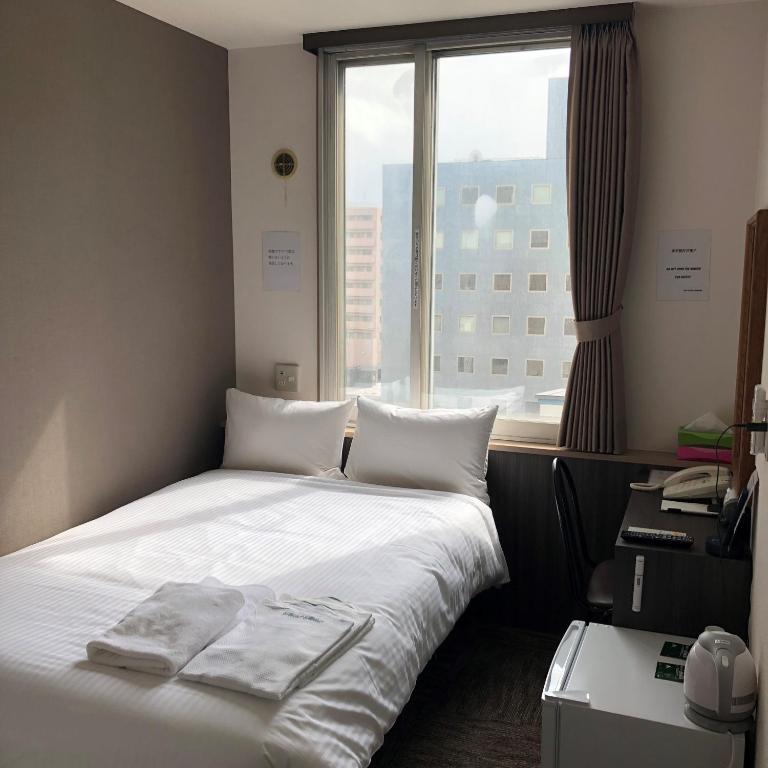 Hotel Tetora Asahikawa Station - Camera Doppia Con Letto Matrimoniale Piccolo - Partenza Anticipata Alle 8:00 - Non Fumatori