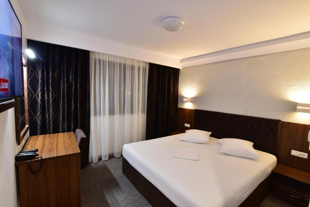 TV a/nebo společenská místnost v ubytování Hotel Forum