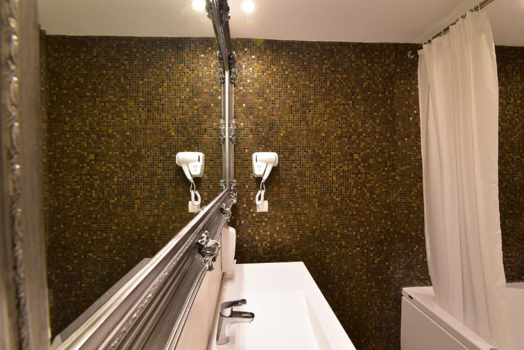 Koupelna v ubytování Hotel Forum