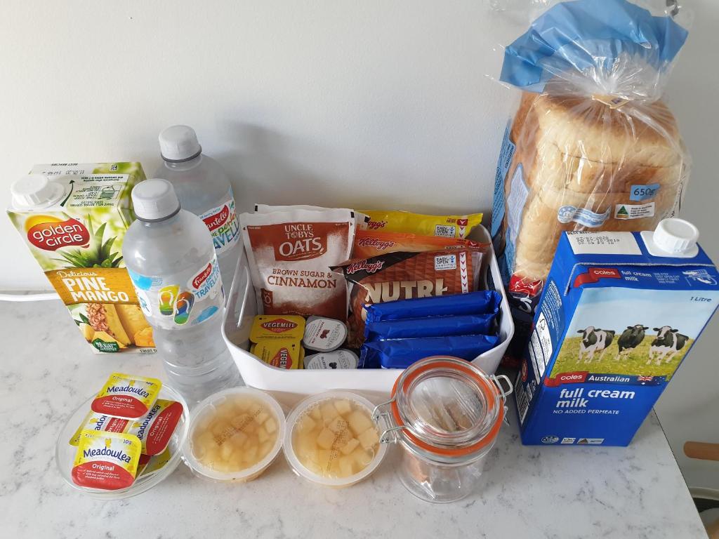 a counter with some food and other food items at Chateau Bass in Bass