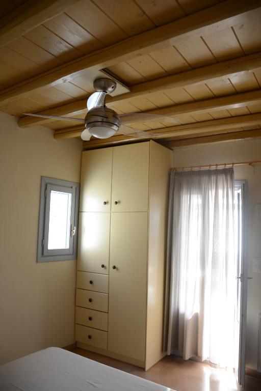 Postel nebo postele na pokoji v ubytování Kaminaki Amorgos