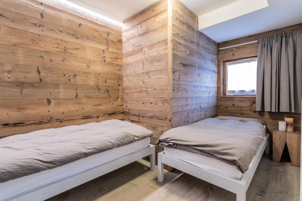 Posteľ alebo postele v izbe v ubytovaní Residence Arnica