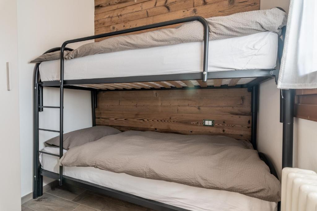 Posteľ alebo postele v izbe v ubytovaní Residence Arnica