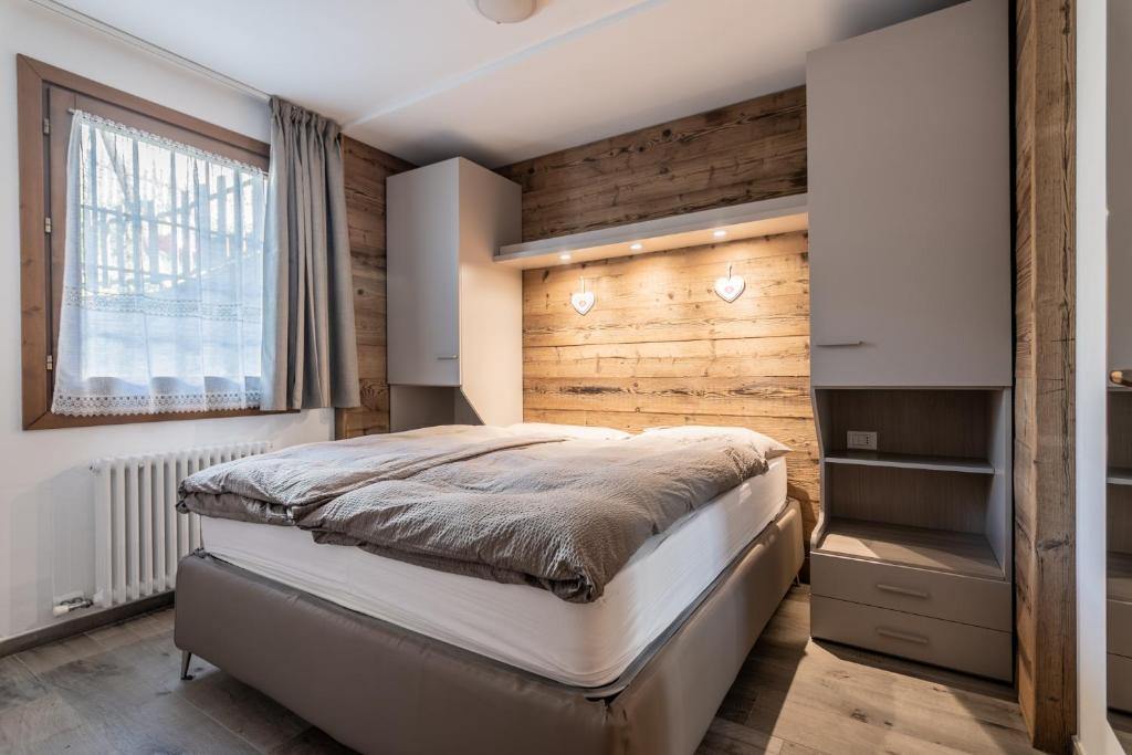 Posteľ alebo postele v izbe v ubytovaní Residence Arnica