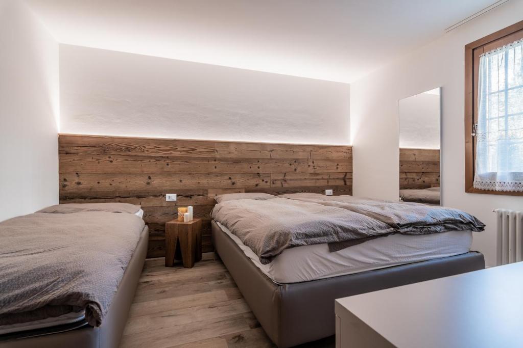 Posteľ alebo postele v izbe v ubytovaní Residence Arnica