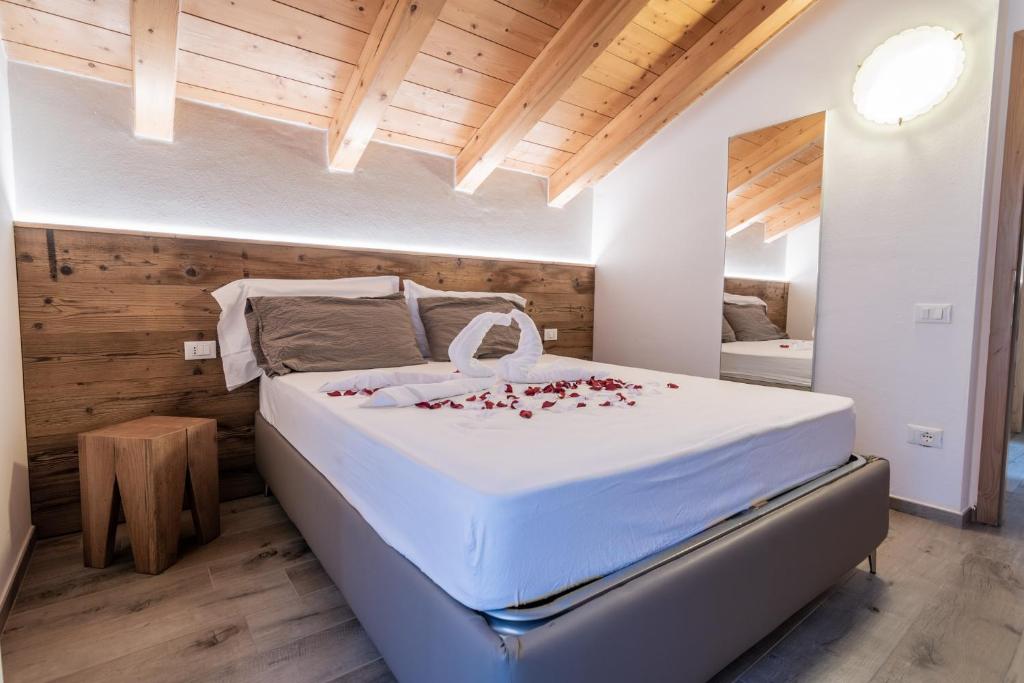 Posteľ alebo postele v izbe v ubytovaní Residence Arnica