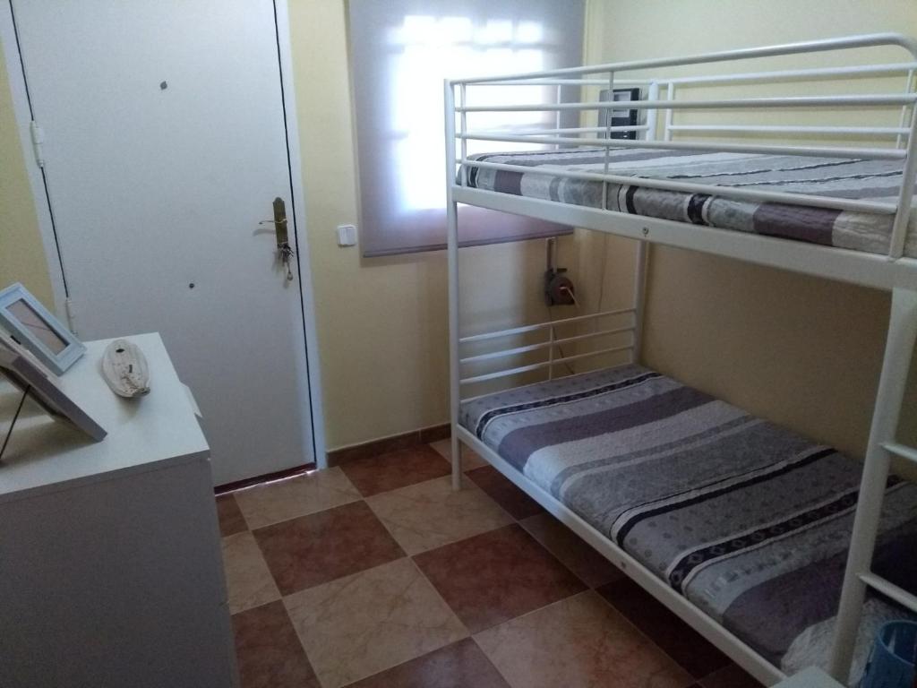 Palanda nebo palandy na pokoji v ubytování Dunas villa