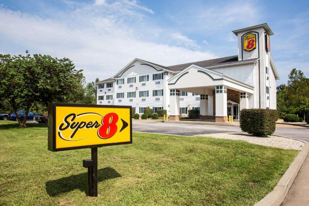 a super sign in front of a building at Super 8 by Wyndham Union in Union