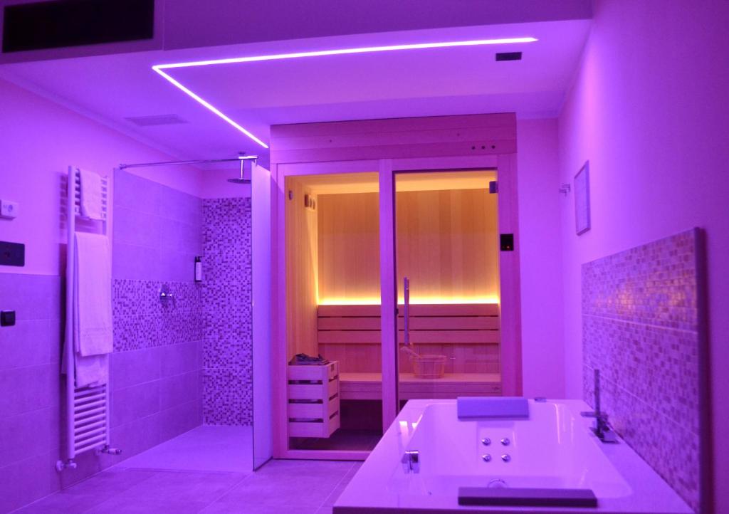Voodi või voodid majutusasutuse Hotel Saccardi & Spa - Adults Only toas