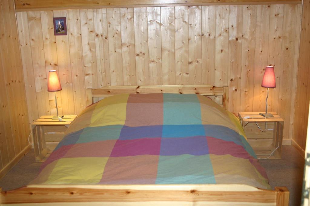 Postel nebo postele na pokoji v ubytování LATITUDE 47