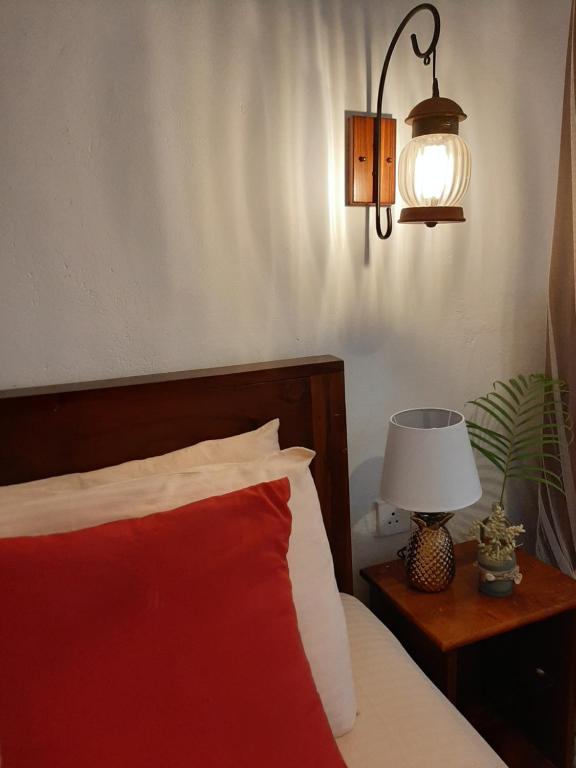 Postel nebo postele na pokoji v ubytování Weligama Ocean Breeze