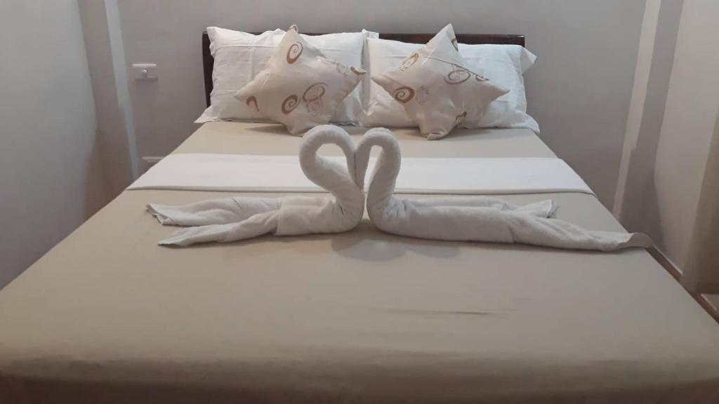 Postel nebo postele na pokoji v ubytování Marnin's Place