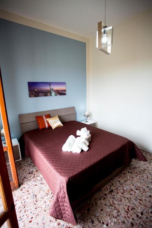 Postel nebo postele na pokoji v ubytování B&B L'Aurora CAPUA