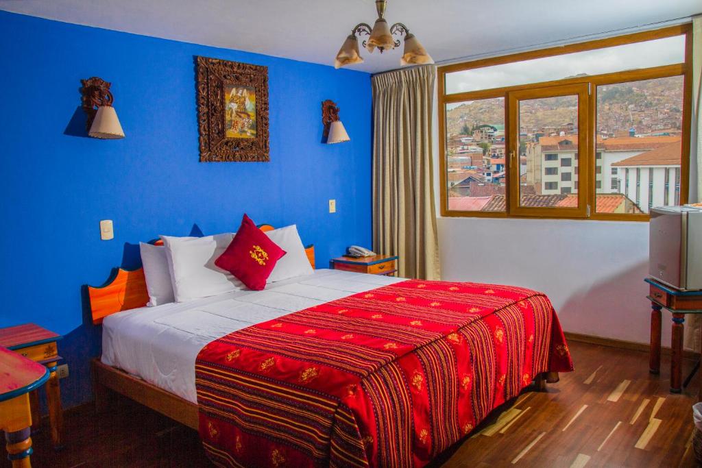 Postel nebo postele na pokoji v ubytování Hotel Warari