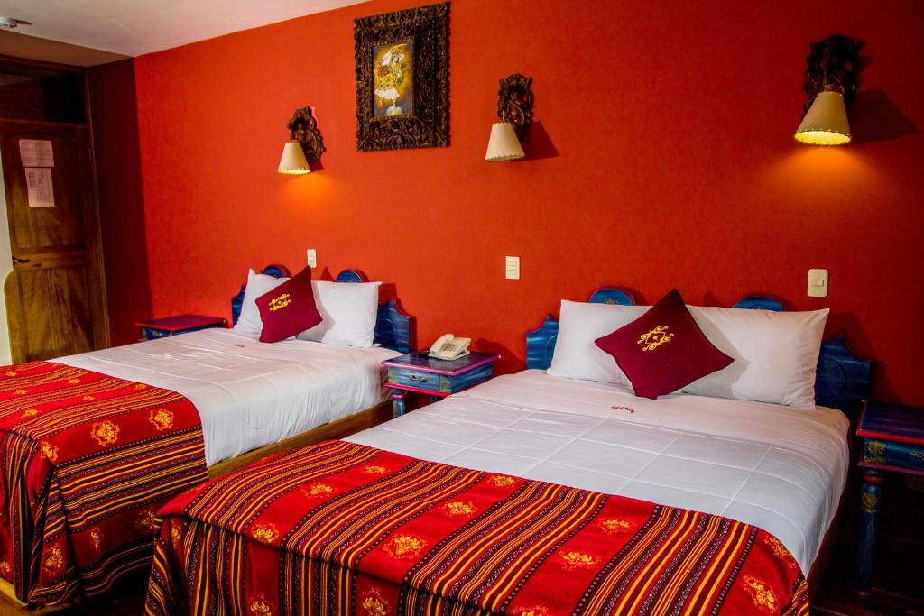 Postel nebo postele na pokoji v ubytování Hotel Warari