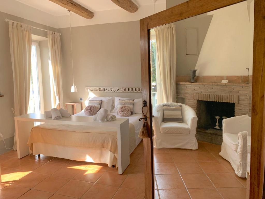 Postel nebo postele na pokoji v ubytování Hotel Borgo Vistalago