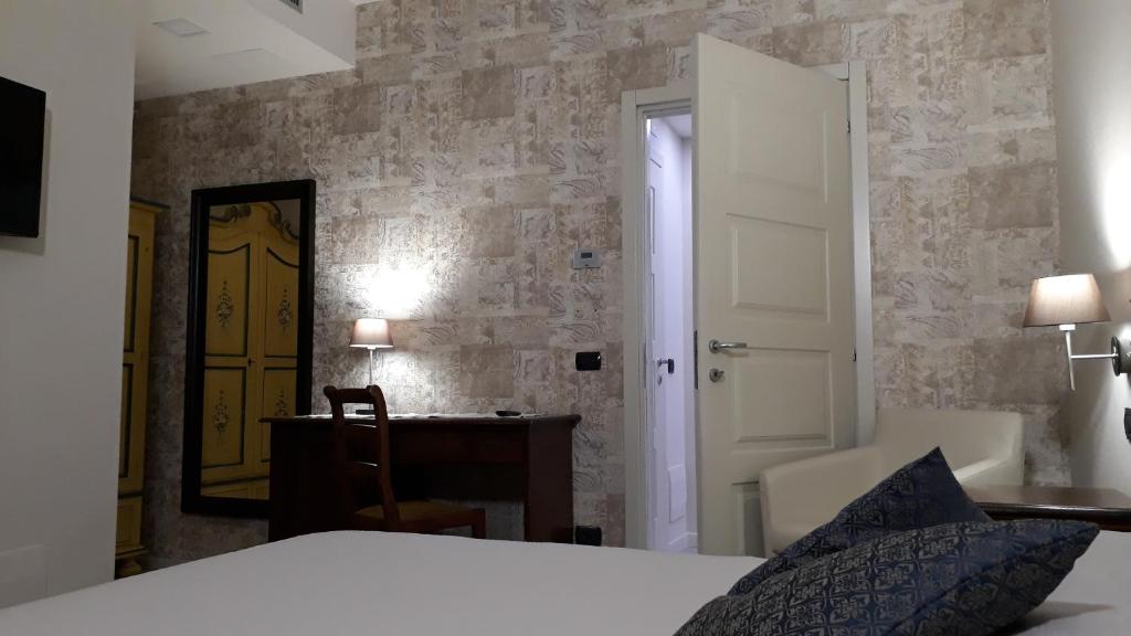 A bed or beds in a room at Resort Limax Acis