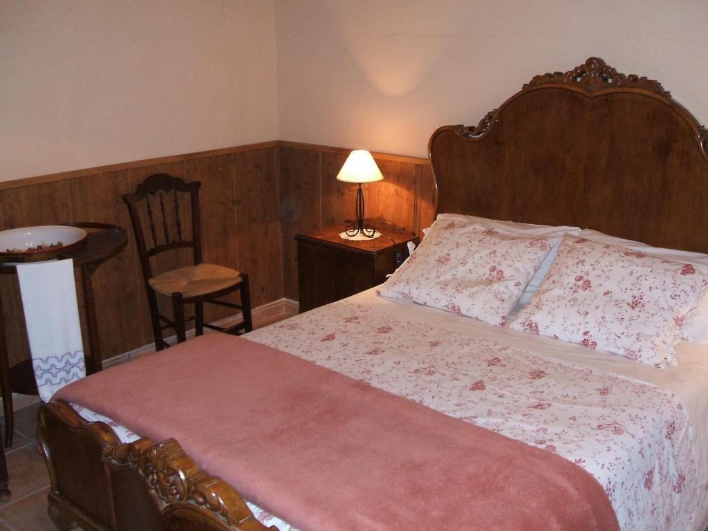 Cama o camas de una habitación en Apartamentos Rurales Fuente de Marzo