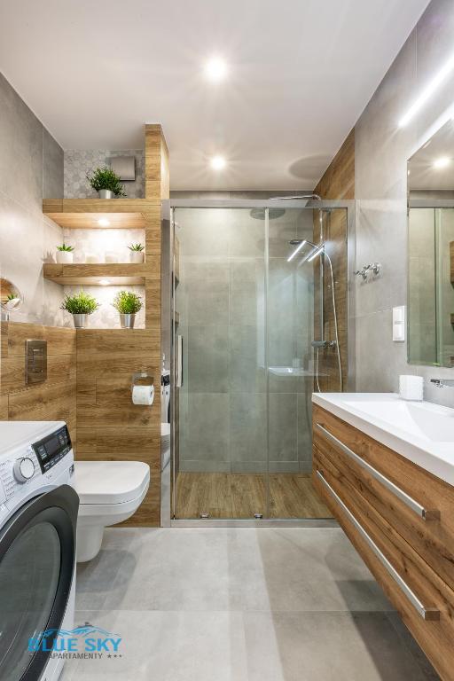 Koupelna v ubytování Apartamenty BlueSky - Ogrodnicza 7 i 9 - z widokiem na góry, w zielonej okolicy, blisko centrum i atrakcji Karpacza