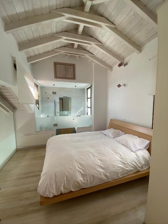 Postel nebo postele na pokoji v ubytování Arachova Vip smart chalet-Villa Eva 1