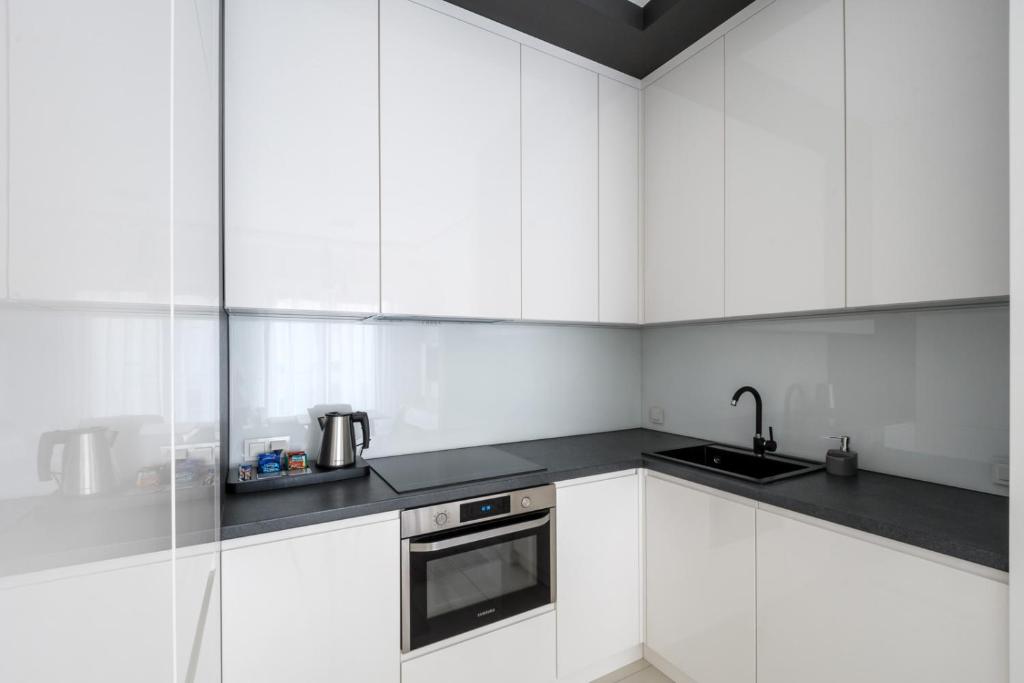 Kuchyňa alebo kuchynka v ubytovaní Exclusive Trendy Apartments