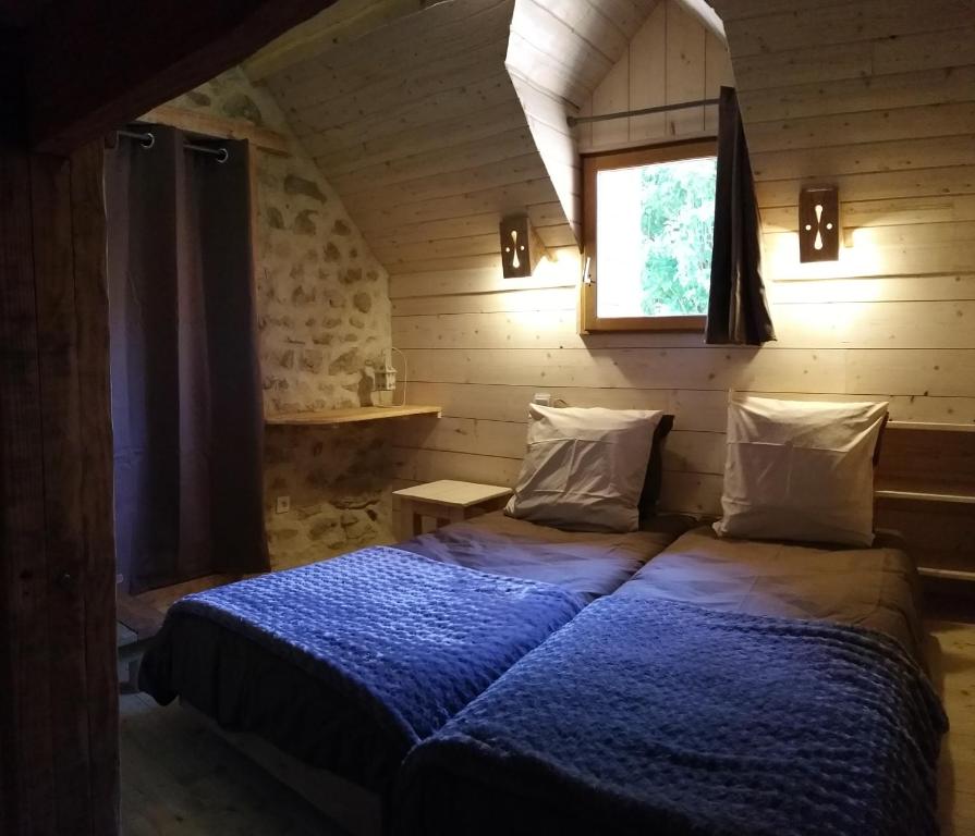 Postel nebo postele na pokoji v ubytování Chambres d'Hôtes Le Plessis à Broye