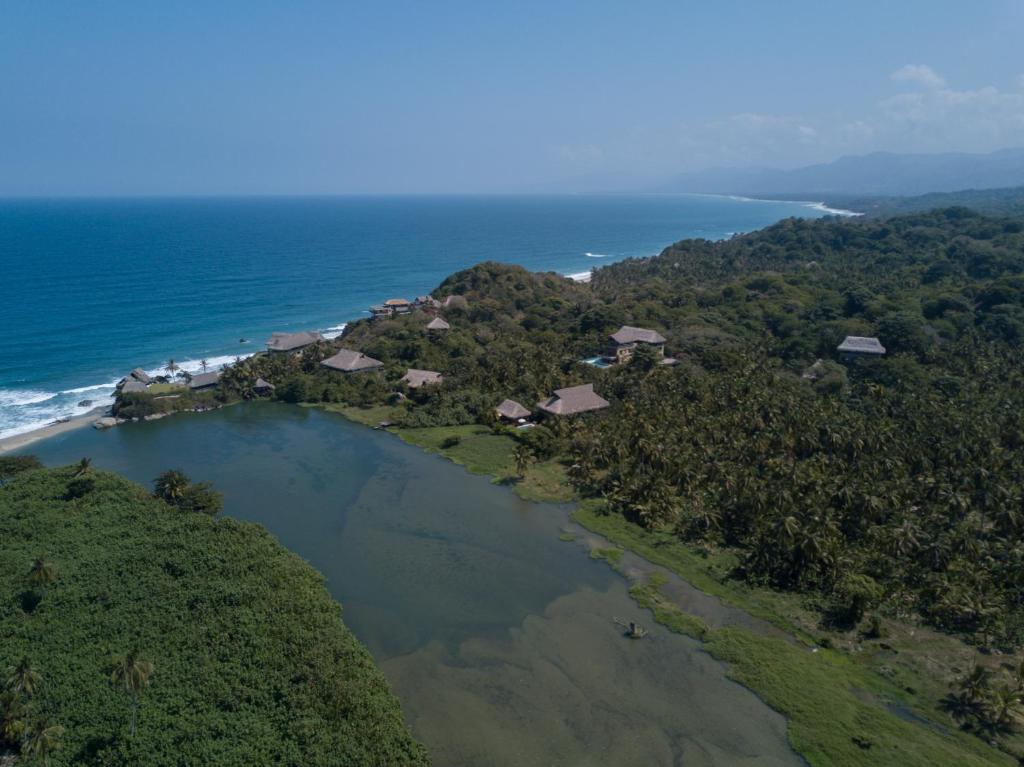 an aerial view of a small island in the ocean at Casa Origen Los Naranjos in Los Naranjos