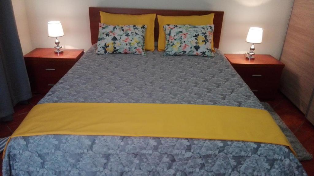 Postel nebo postele na pokoji v ubytování Lindo Apartamento Villa