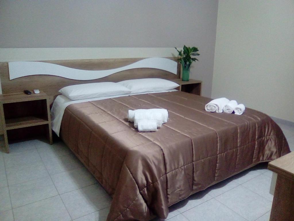 Postel nebo postele na pokoji v ubytování B&B AEREOSTATION