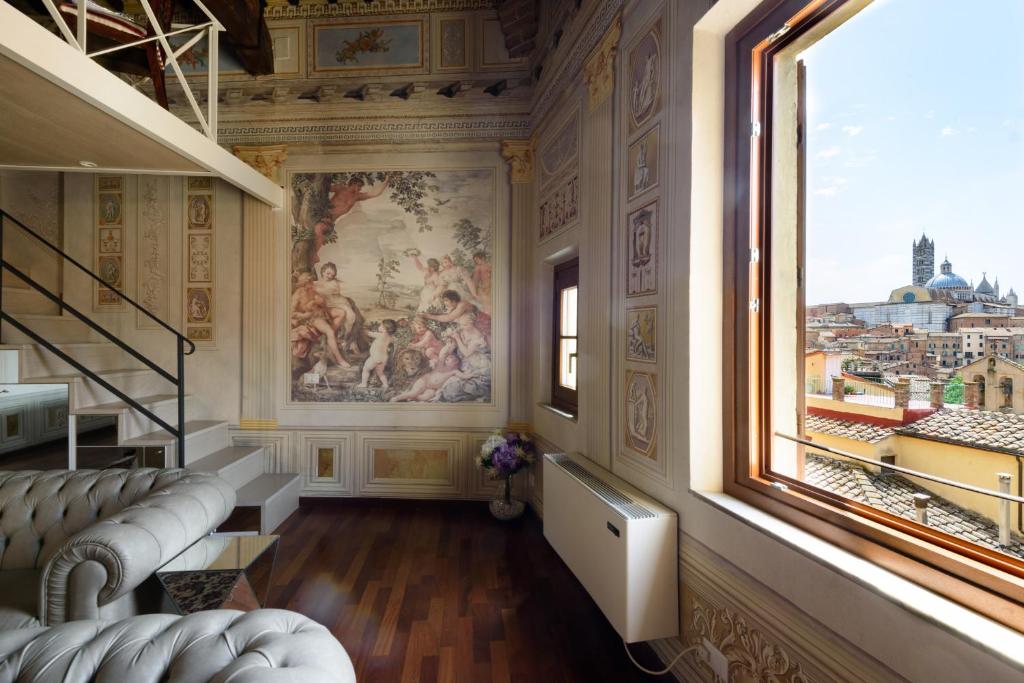 A seating area at Domus Nannini SPA - Palazzo Nannini