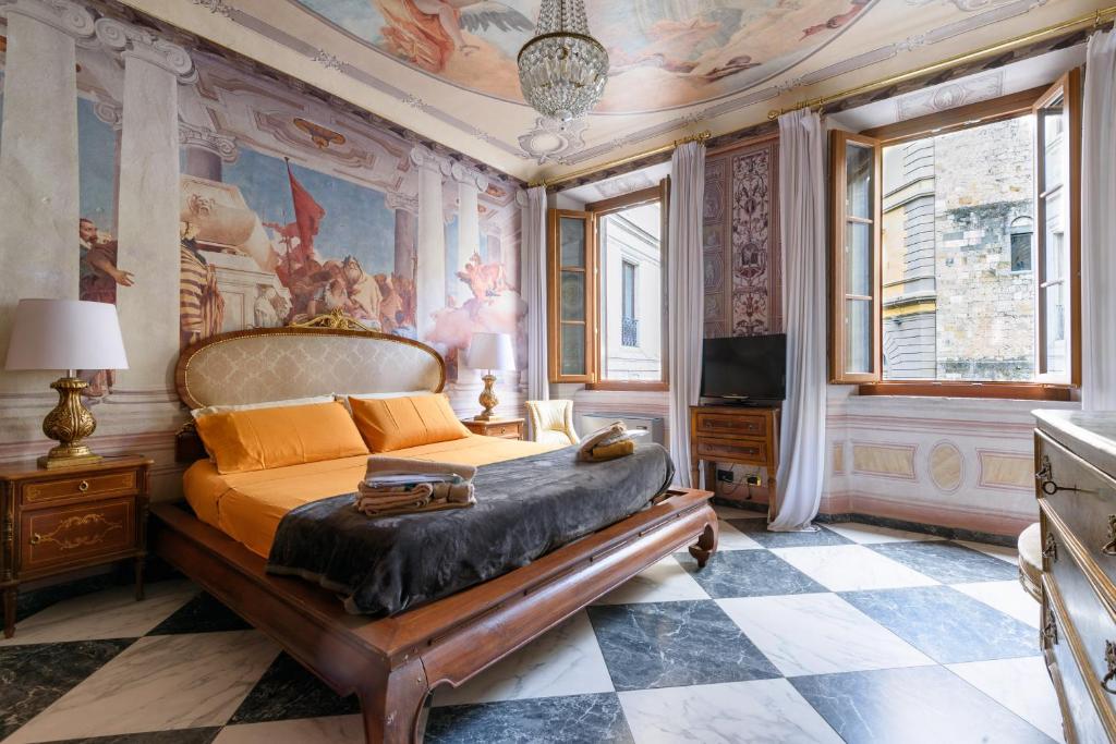 A television and/or entertainment centre at Domus Nannini SPA - Palazzo Nannini
