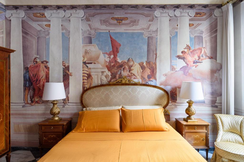 A bed or beds in a room at Domus Nannini SPA - Palazzo Nannini