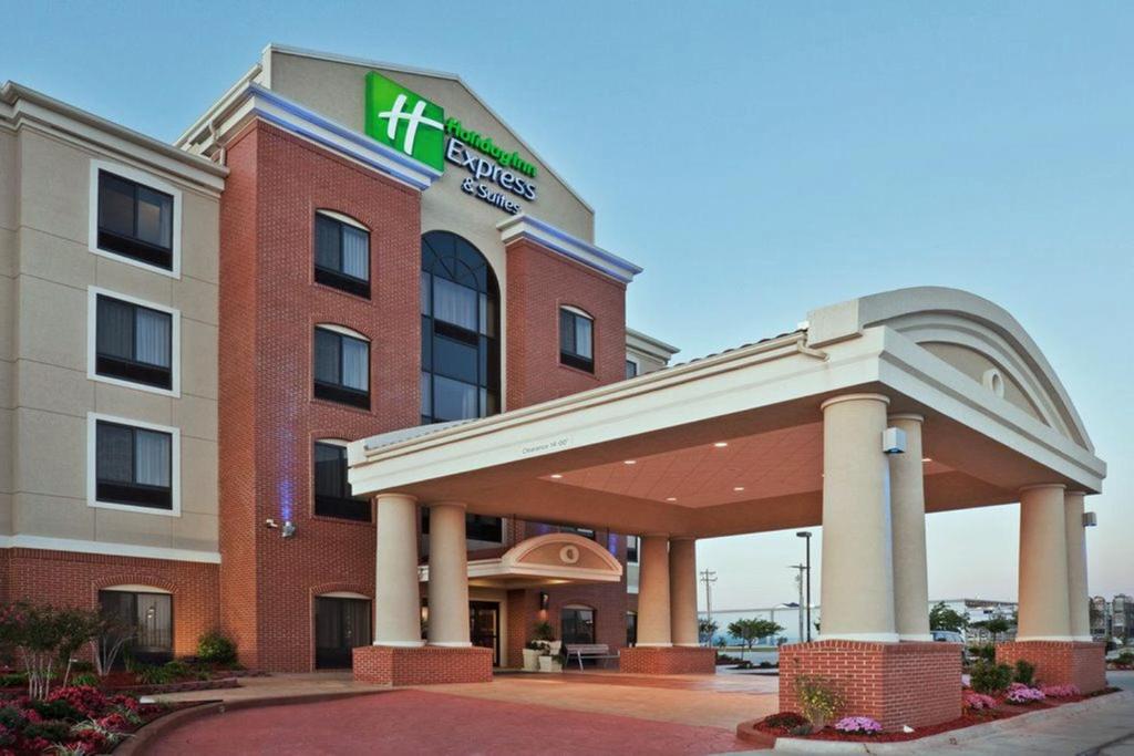 a hotel with a sign on the front of it at Holiday Inn Express Greensburg, an IHG Hotel in Greensburg