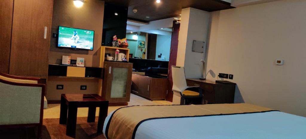 TV a/nebo společenská místnost v ubytování Dimora Hotels And Resorts