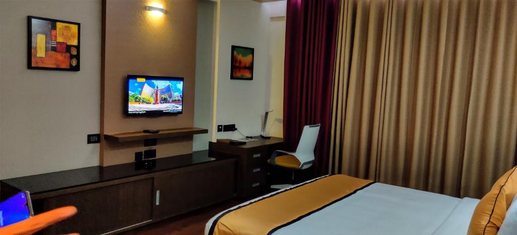 TV a/nebo společenská místnost v ubytování Dimora Hotels And Resorts
