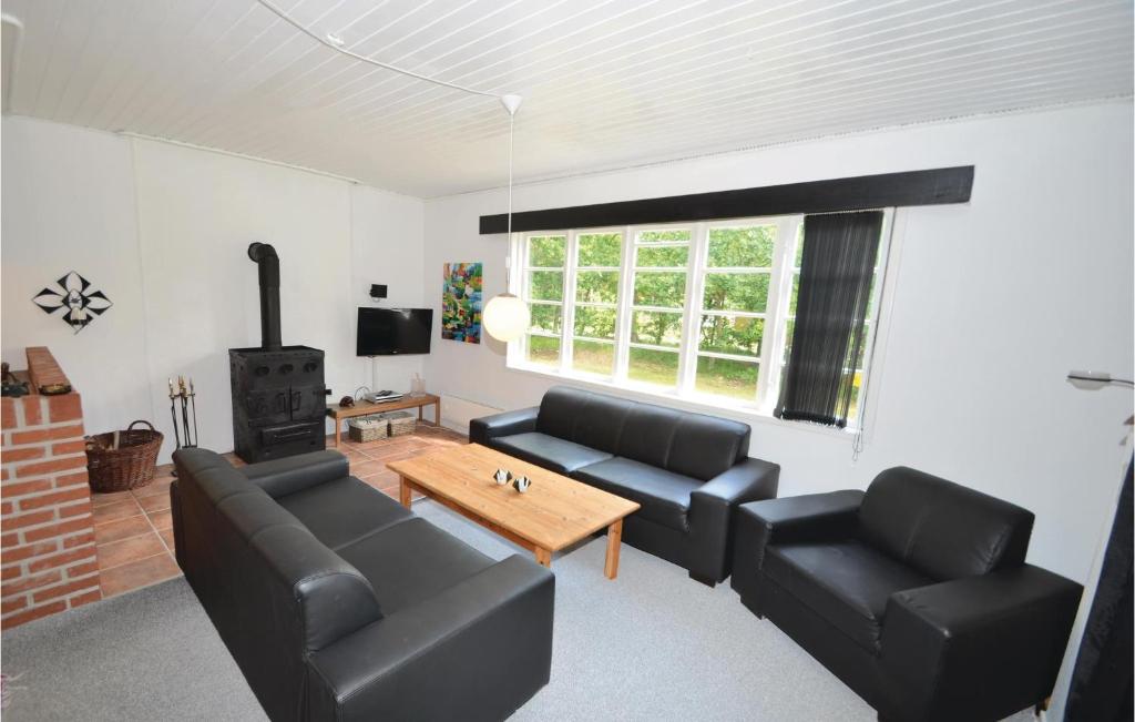 Posezení v ubytování Holiday Home Gyvelvej Ebeltoft Iii