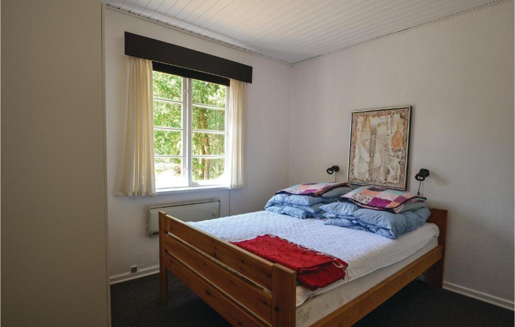 Postel nebo postele na pokoji v ubytování Holiday Home Gyvelvej Ebeltoft Iii