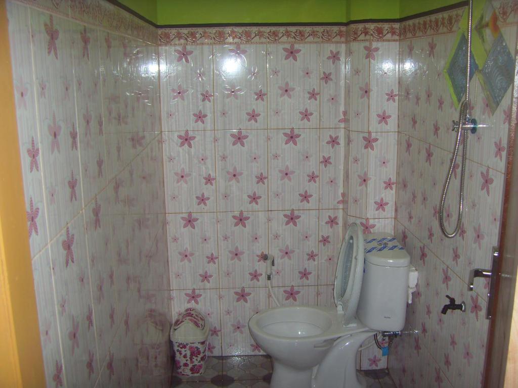 Koupelna v ubytování Cahyo Homestay Bromo