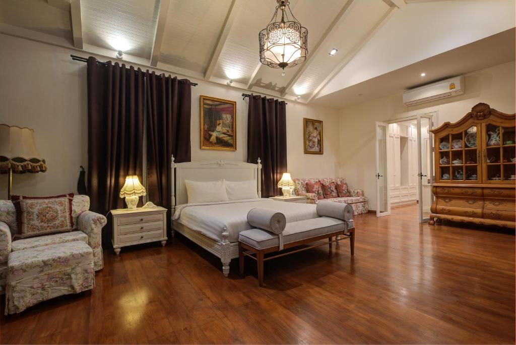 Postel nebo postele na pokoji v ubytování Chateau de Prim Khao Yai