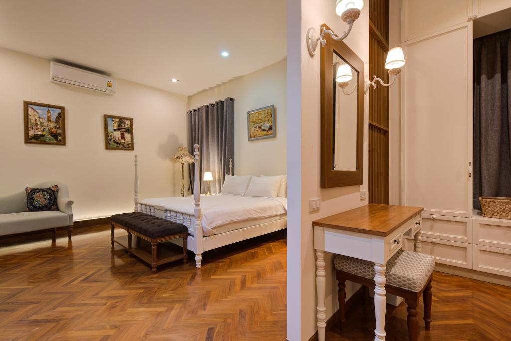 Postel nebo postele na pokoji v ubytování Chateau de Prim Khao Yai