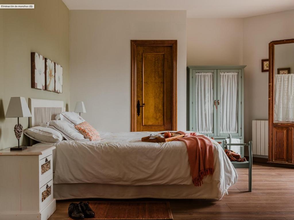 Cama o camas de una habitación en Hospedería del Valle Boutique Apartments