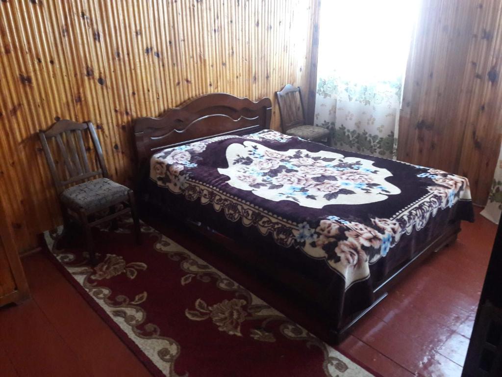 Postel nebo postele na pokoji v ubytování Shorena's Homestay
