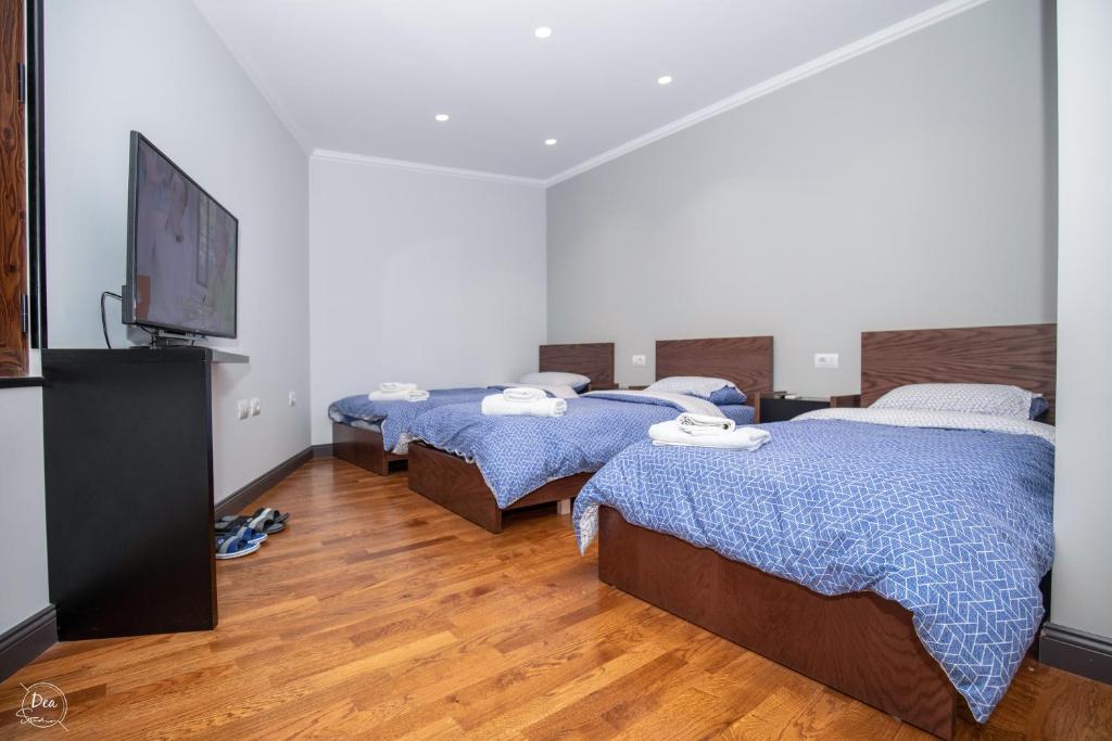 Postel nebo postele na pokoji v ubytování Suite Terrace Rooms & Apartments